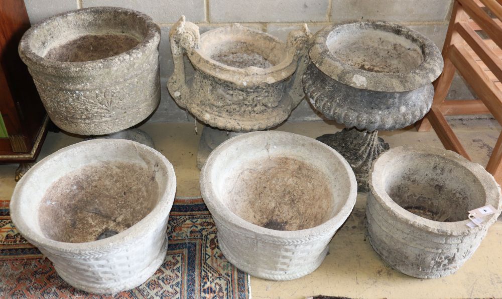 Six reconstituted stone garden planters, largest 44cm diameter, H.52cm